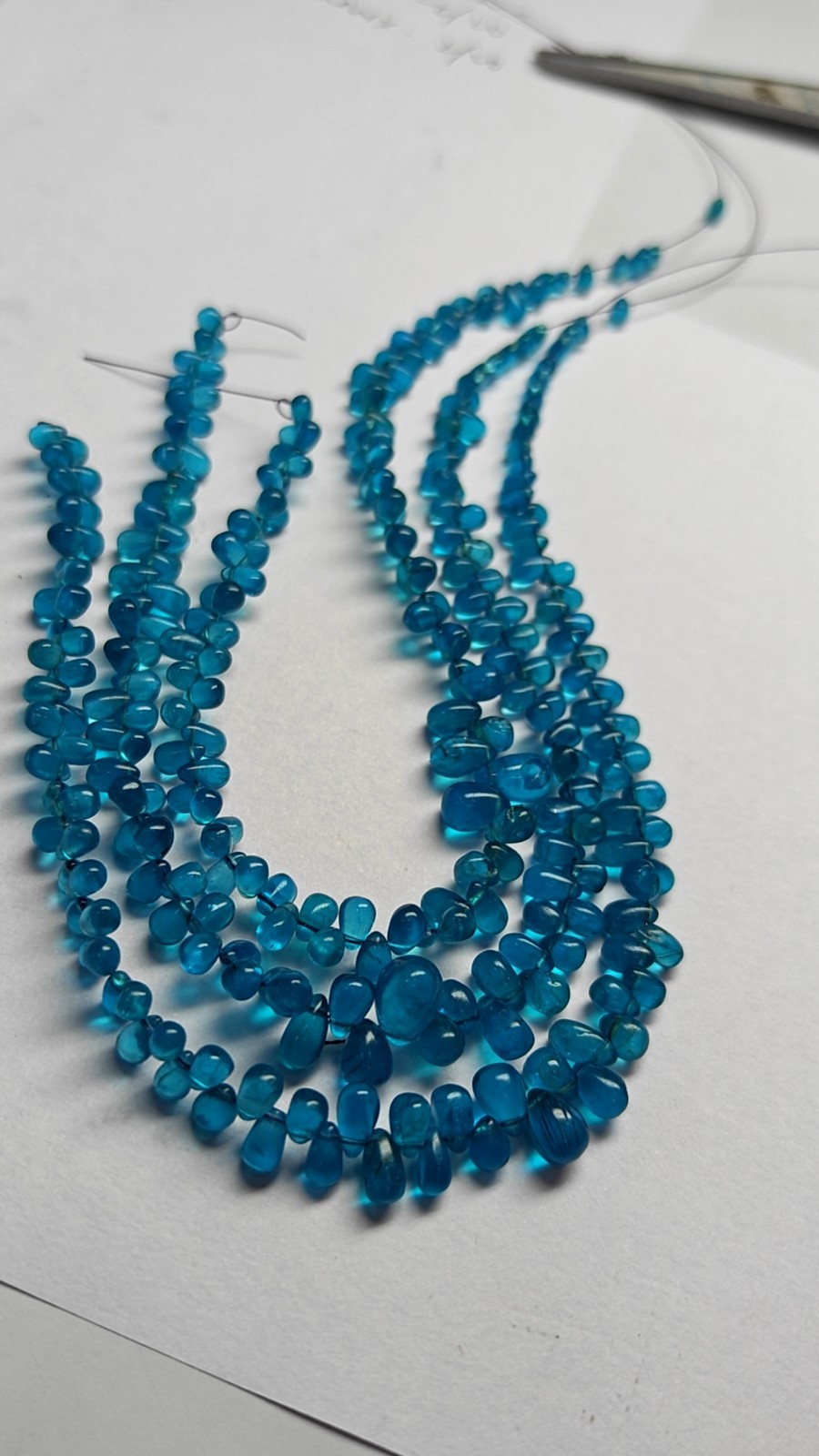AAA Neon Blue Apatite Teardrop Beads: Smooth Gemstone Strand (6 Inches)