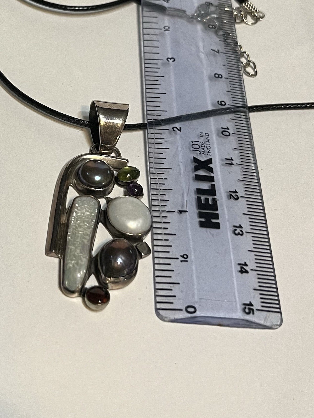 vintage style multi gem sterling silver pendant on 24 inch long black cord.new
