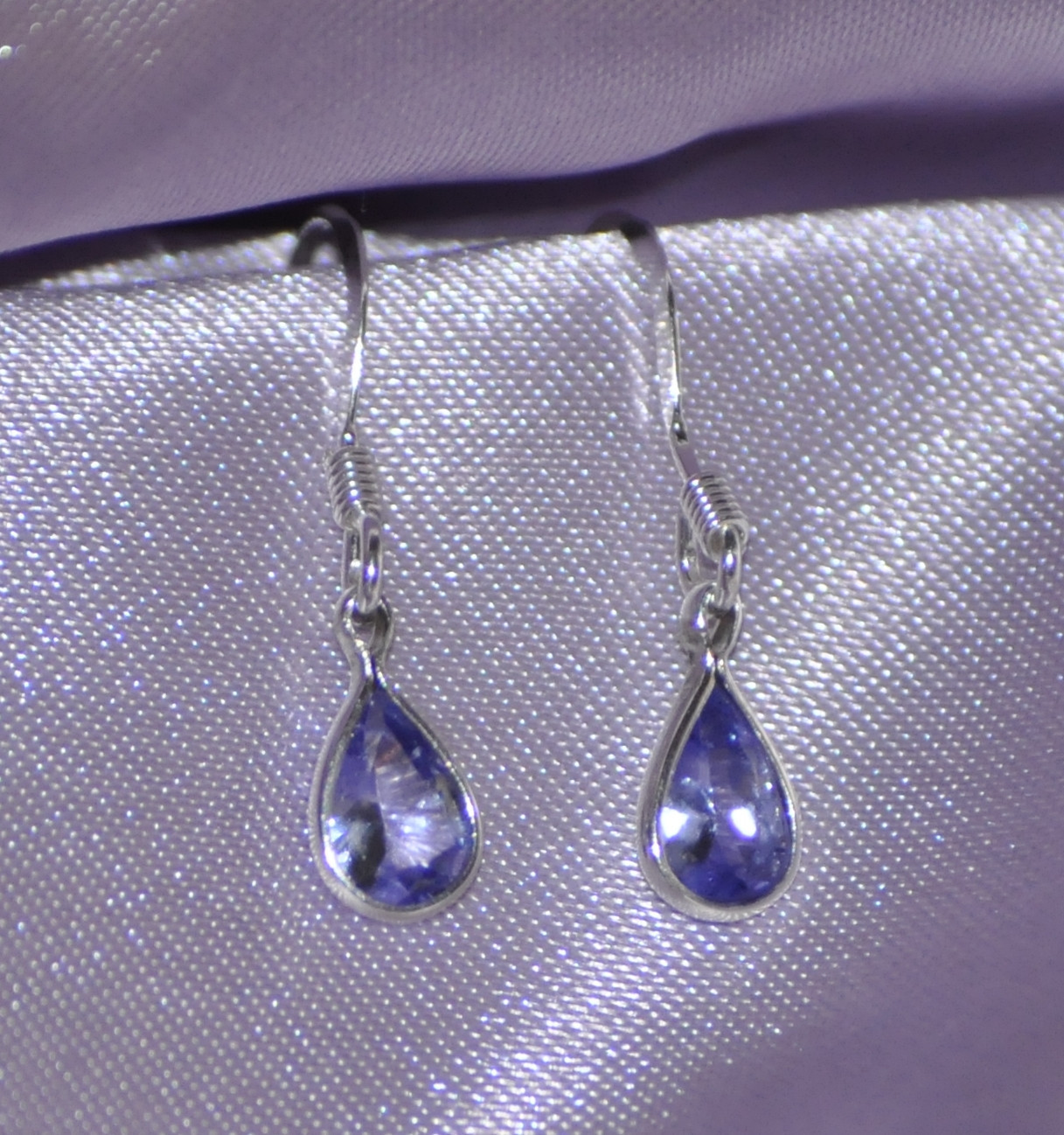 ONE PAIR 6mm x 4mm PEAR SHAPE TANZANITE DROPS- EARRINGS SET IN STERLING SILVER