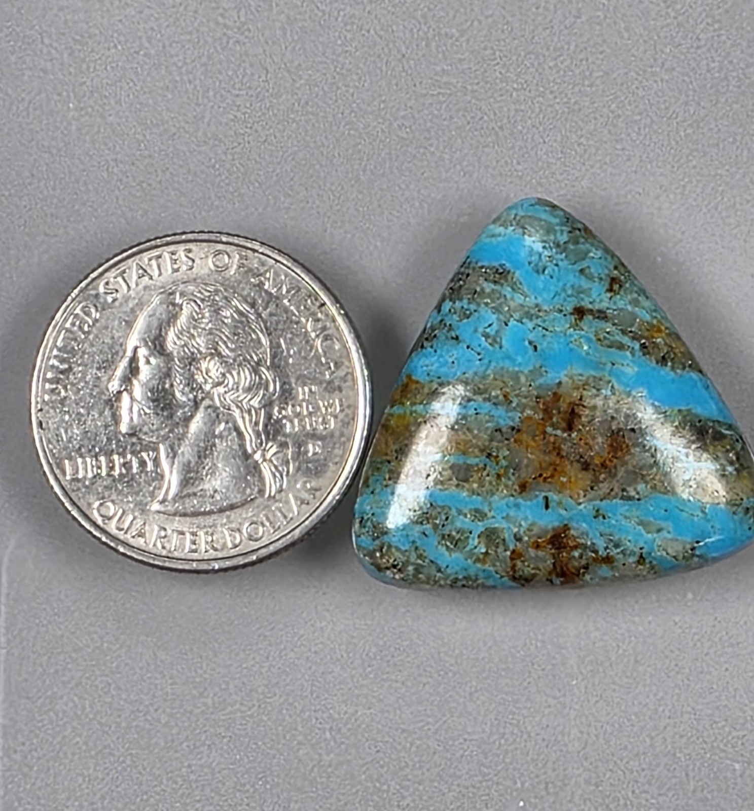 Kingman turquoise cabochon, boulder pattern, trillion cut, 30.49 carats, #B23