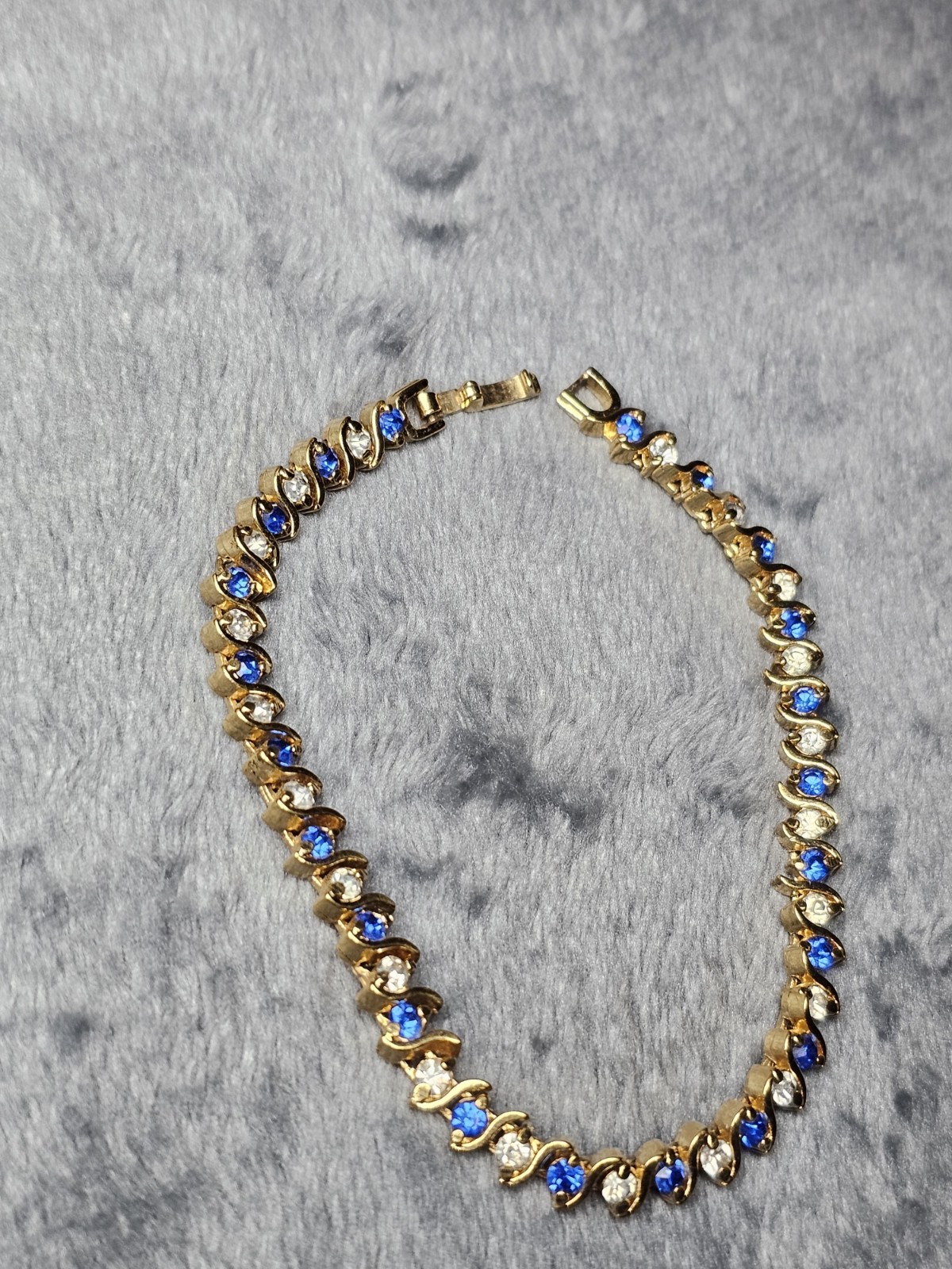 Gold Tone Blue & Clear Rhinestone S-Link Tennis Bracelet Fold-Over Clasp