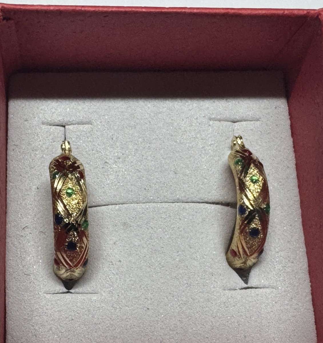 14K Yellow Gold Huggie Earrings with Gemstones dotted all around .9g