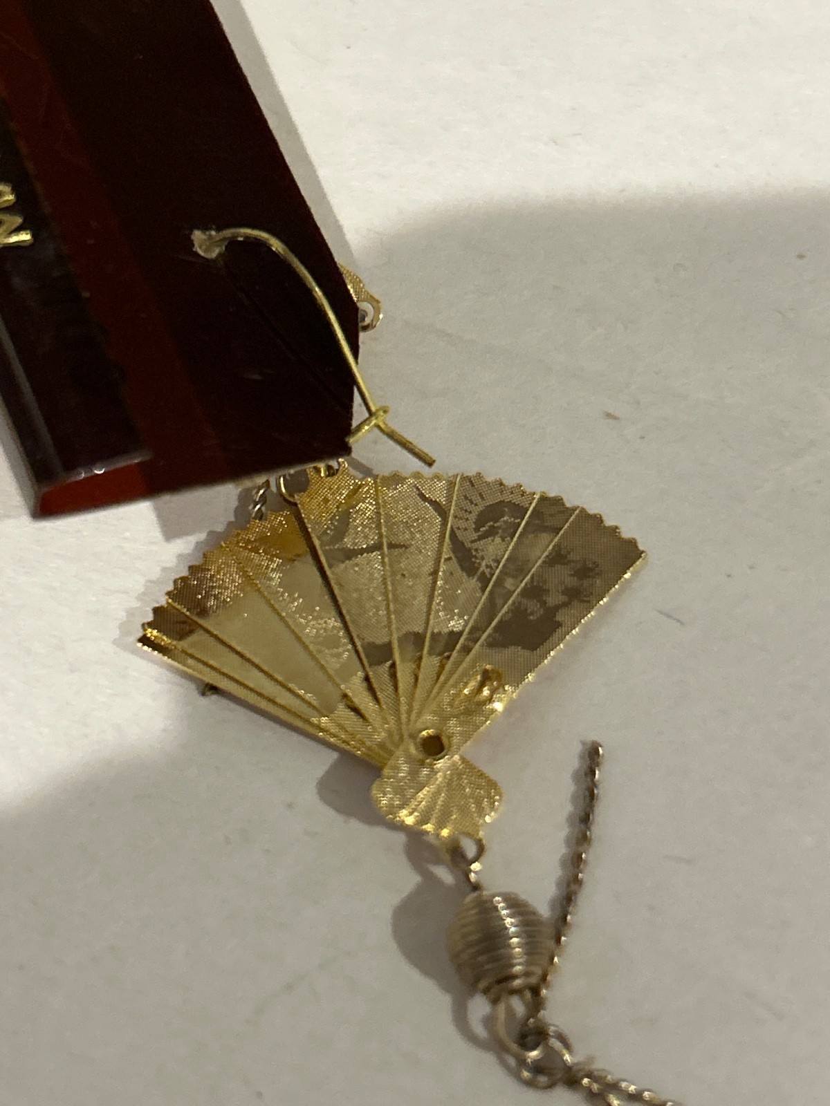 Asian Styled Adjustable Fan Earrings and Necklace. The chain is 10k