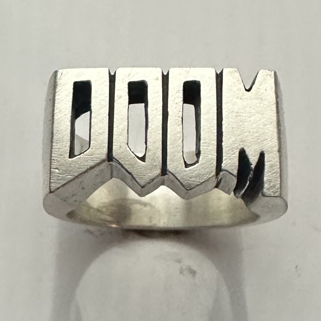 MJG STERLING SILVER DOOM RING. 23 GRAMS. BIKER. GUITAR PLAYER