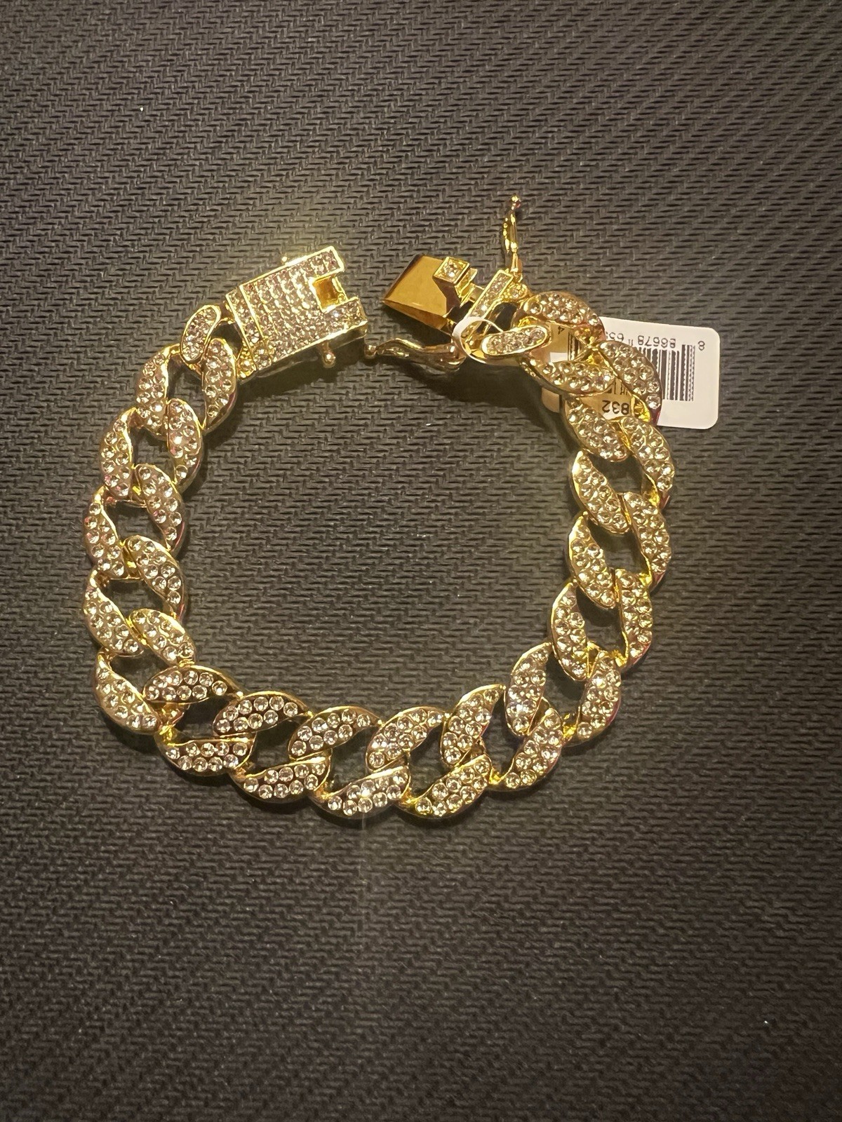 80832 – Invicta Elements Men’s Iced out Cuban Chain Bracelet, Gold