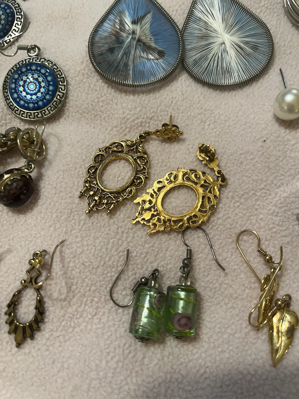 Mixed Lot Of 13 Pairs Of Earrings. 4 rings. Preowned