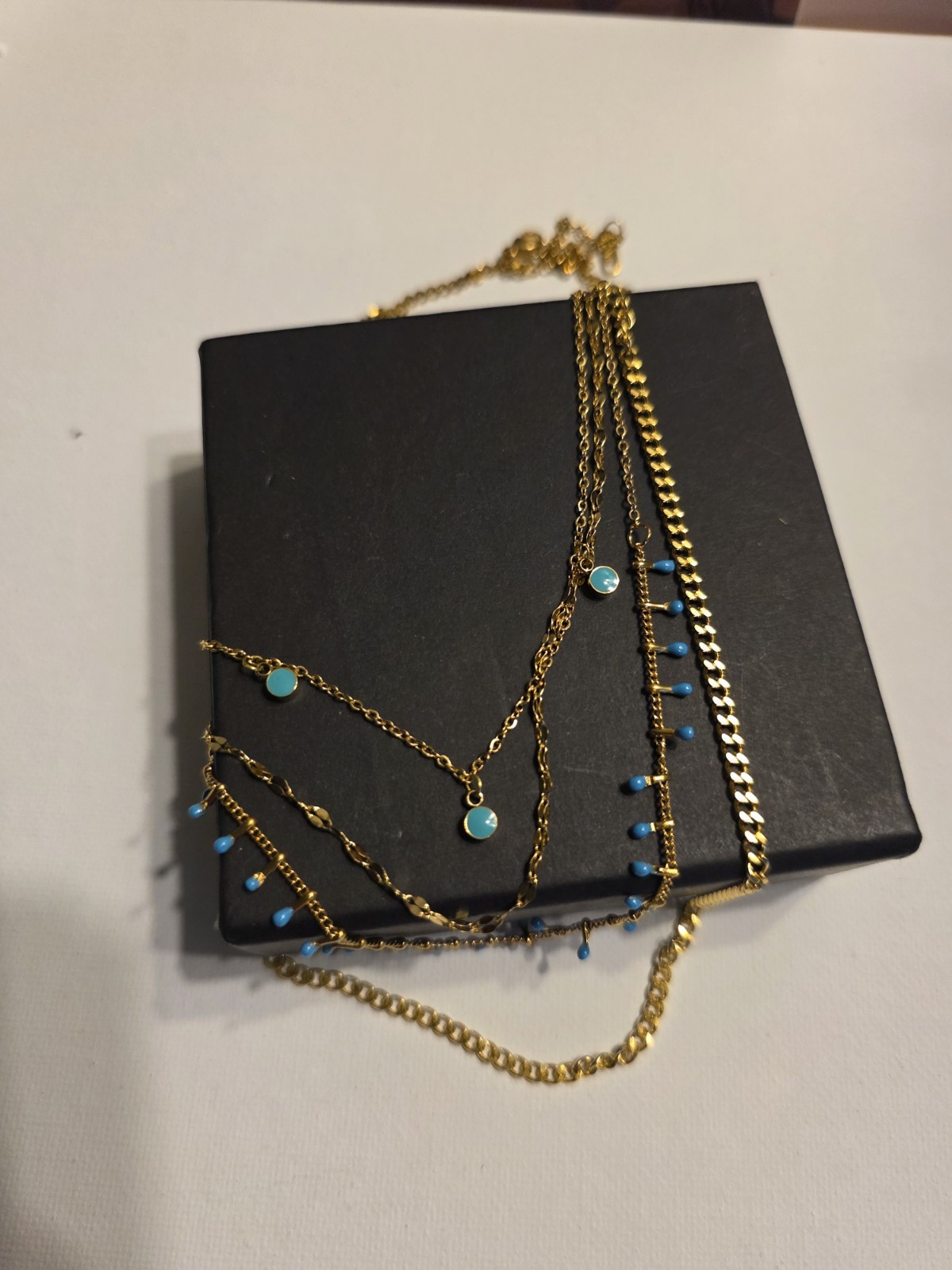 Gold Tone Layered Cable Chain Necklace with Blue Accents, Lobster Closure