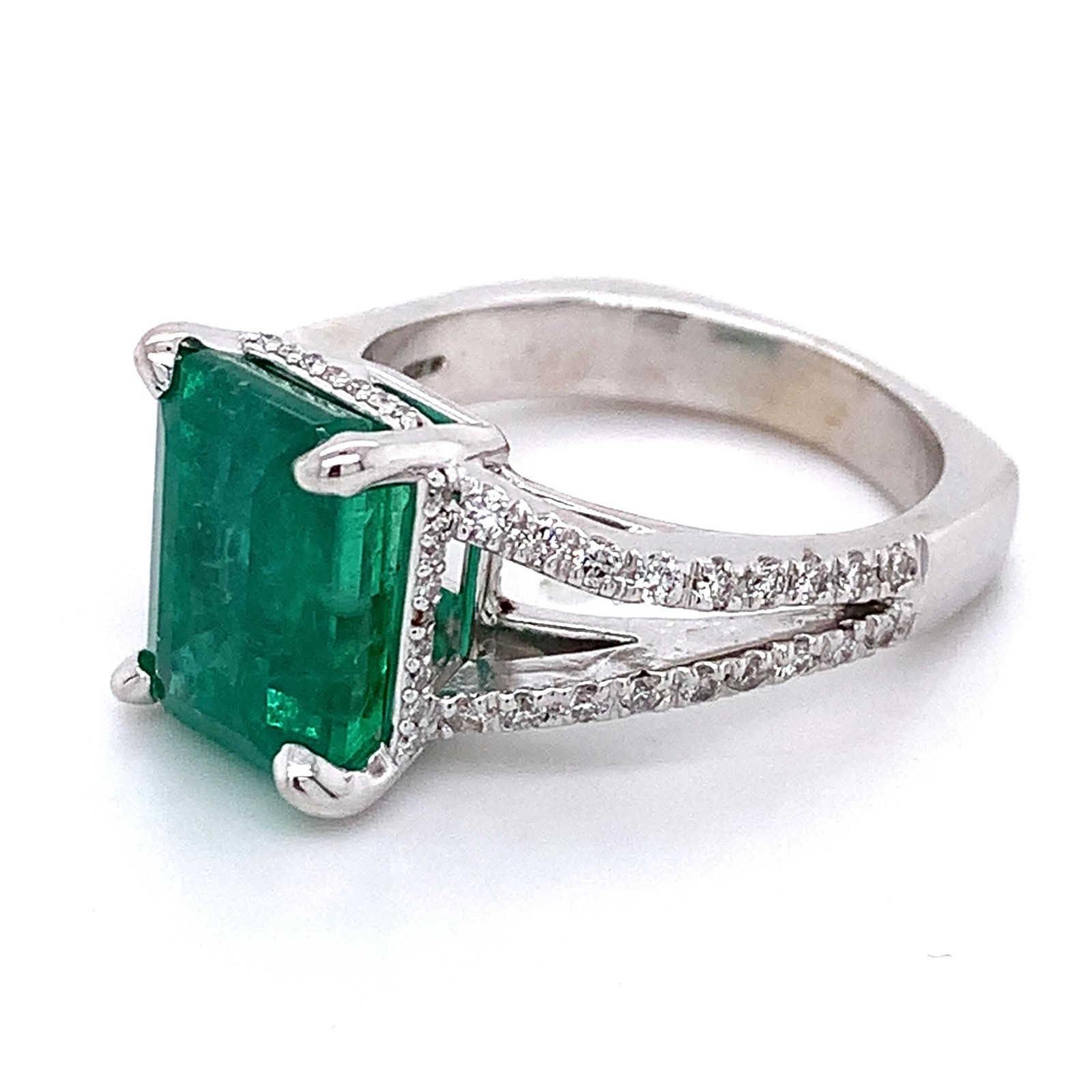14K White Gold Emerald and Round Diamond Split Shank Open Cathedral Ring