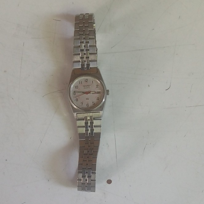 Seiko Quartz Women’s Silver Stainless Bracelet Watch White Dial Arabic Date 24mm