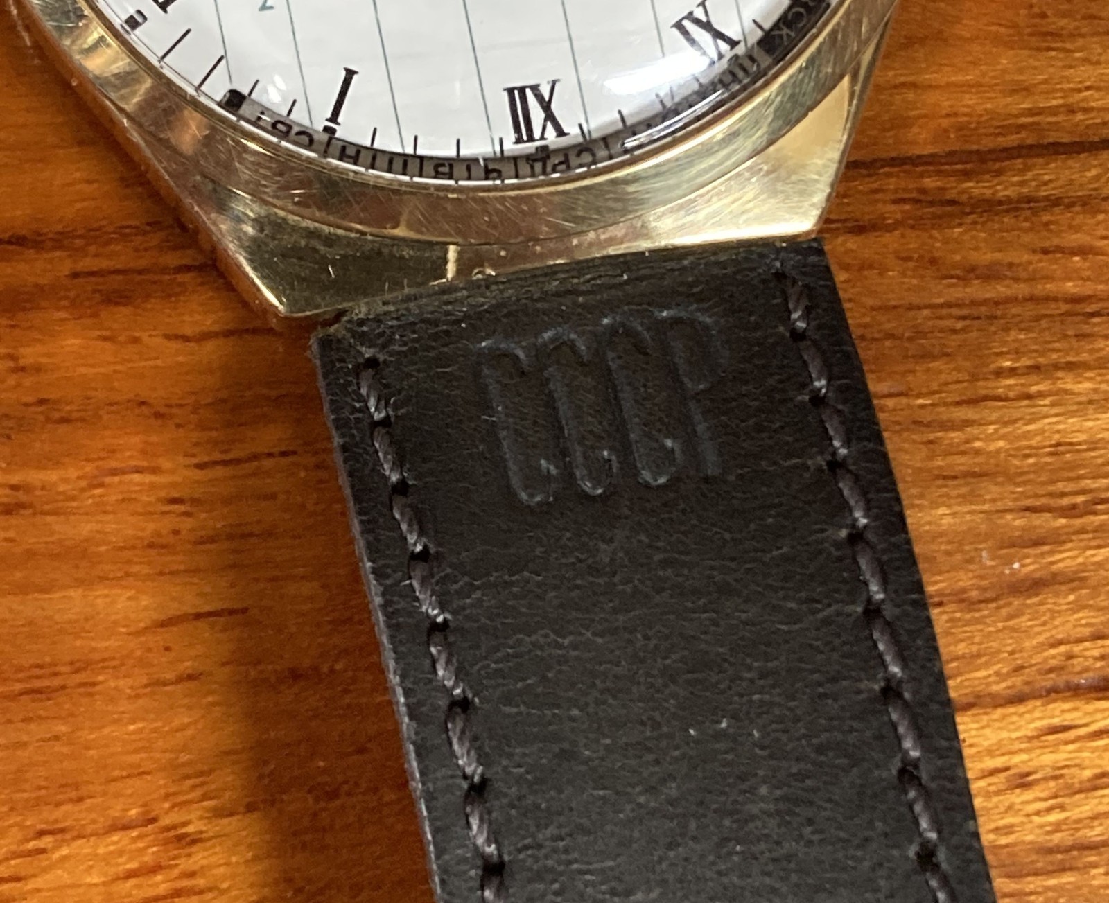 Raketa perpetual calendar watch from USSR, with leather band stamped “CCCP”