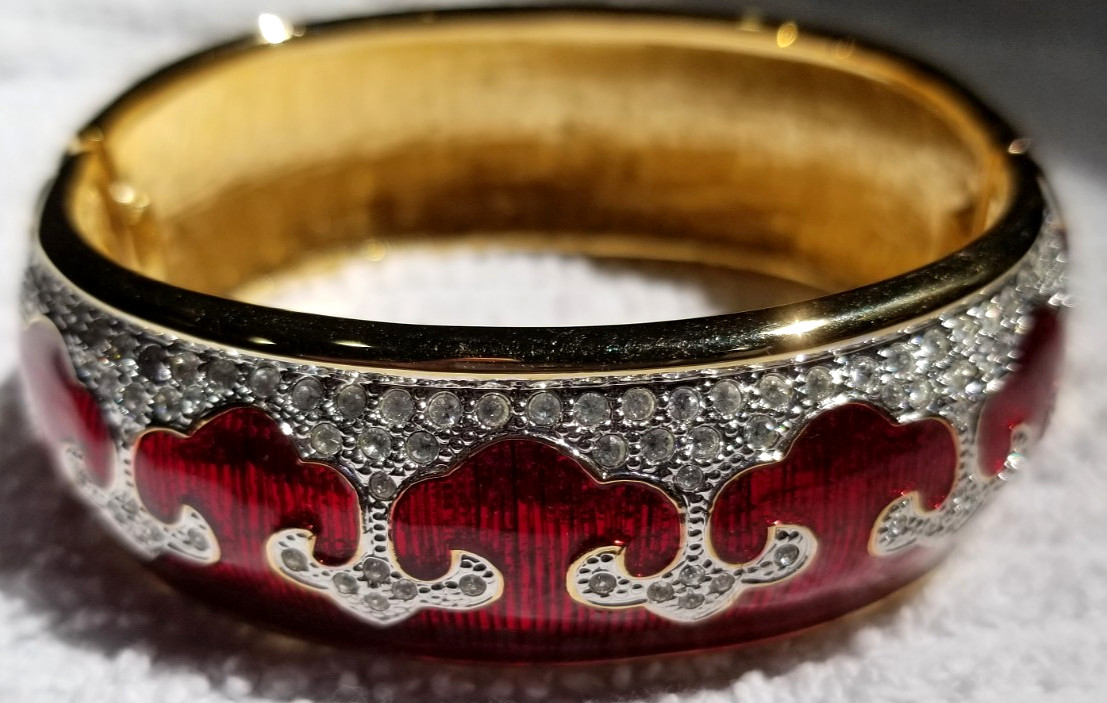 Bejeweled cuff bracelet with Red enamel and Gold tone metal Mint condition