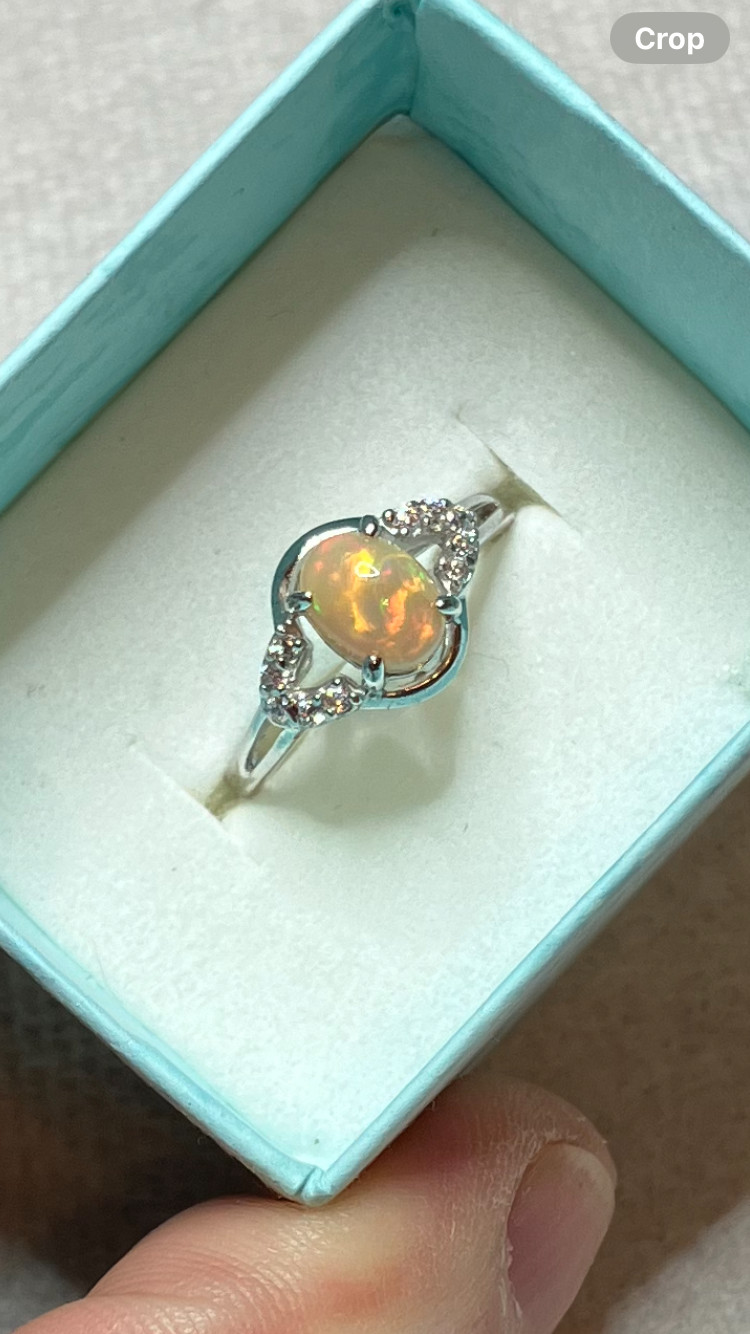 #138B- 0.95ct Genuine Ethiopian Welo Opal set in a Size 8.5 Sterling Silver Ring