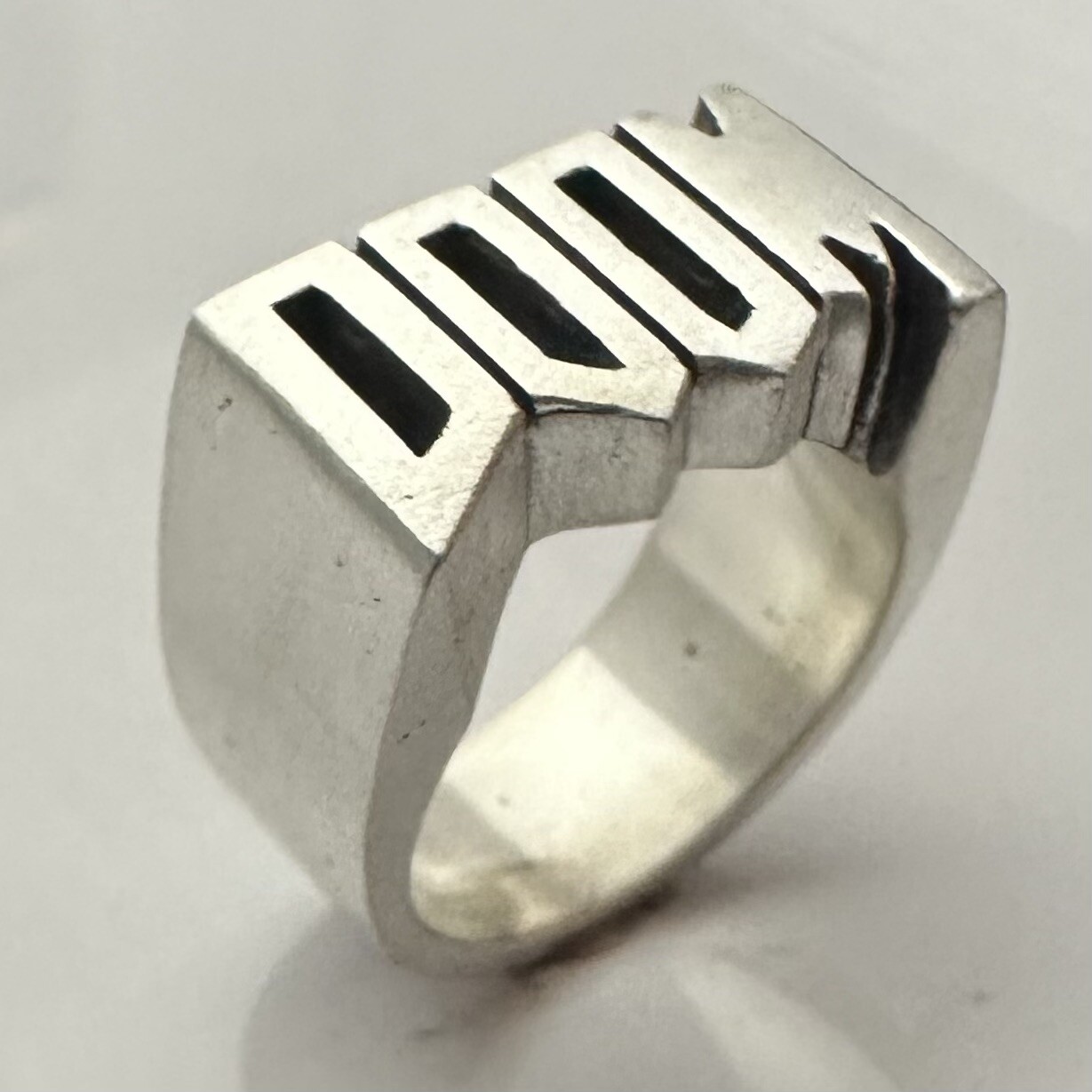 MJG STERLING SILVER DOOM RING. 23 GRAMS. BIKER. GUITAR PLAYER