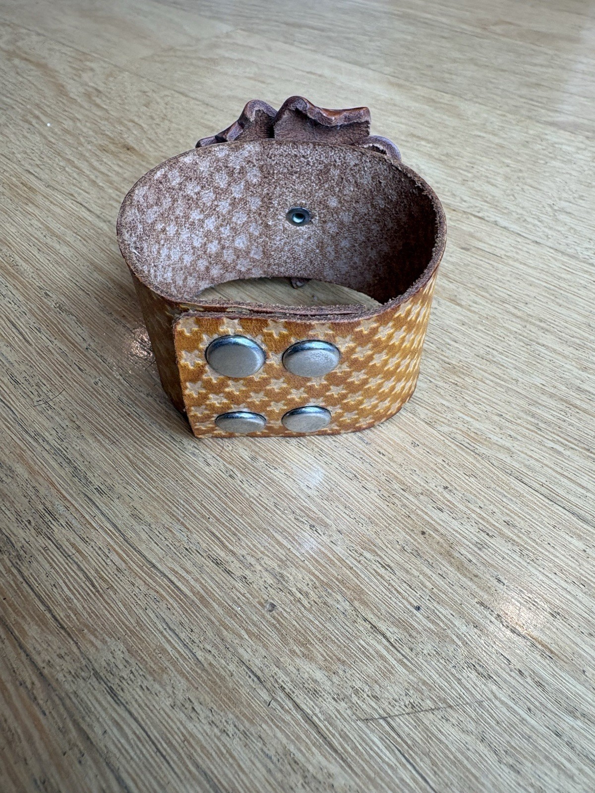 Brown Leather Adjustable Cuff Bracelet Snap Closure Flower Detail. 8.25in Length