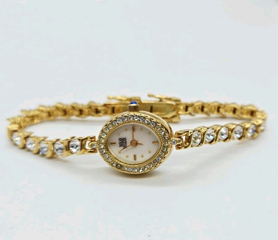 Nolan Miller Watch Tennis Bracelet Crystal Gold tone New battery Oval 7.25 in