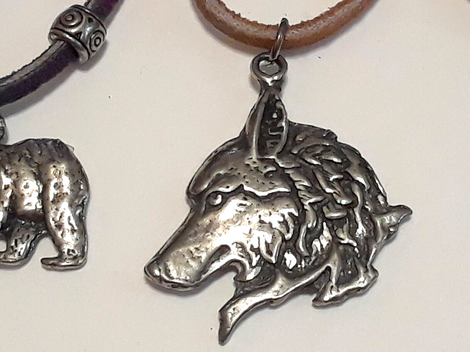 Animal shape pendants silver tone on leather rope chains 18″ long. 5 necklaces