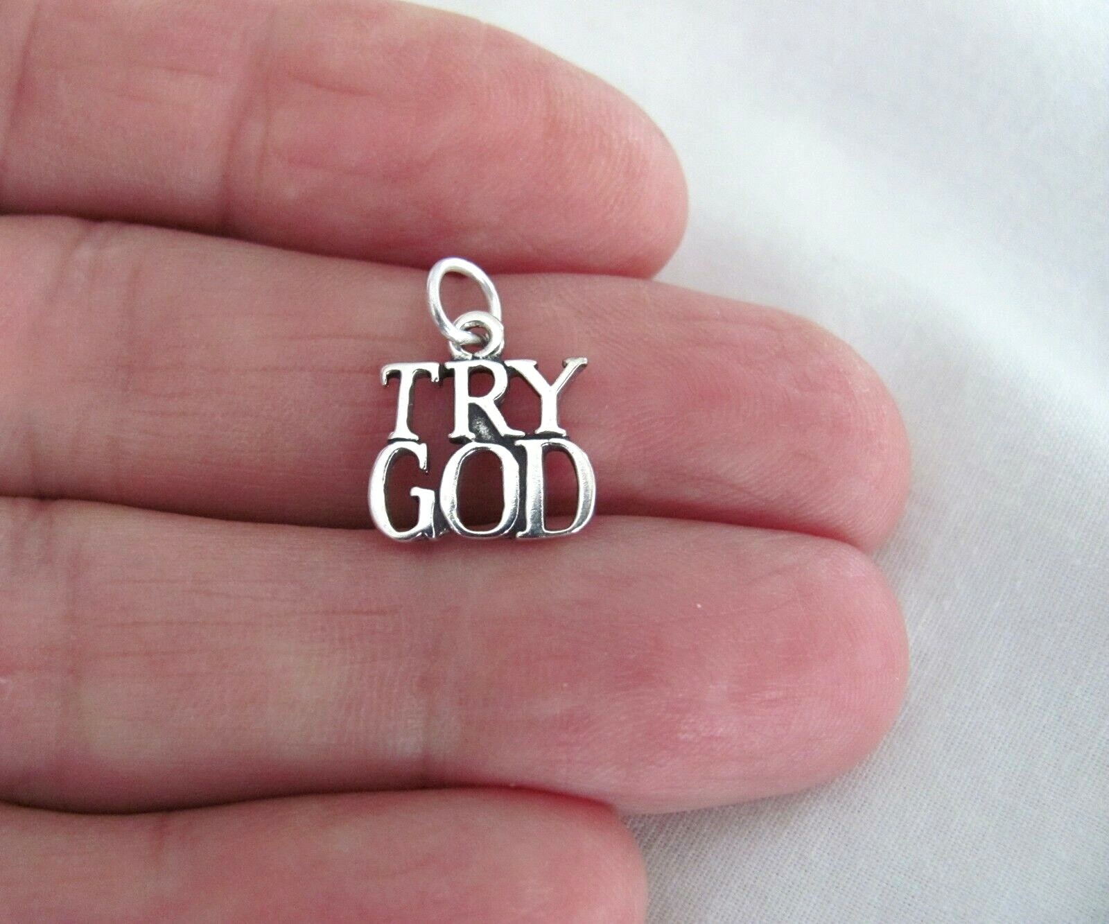 Sterling Silver try God small charm.