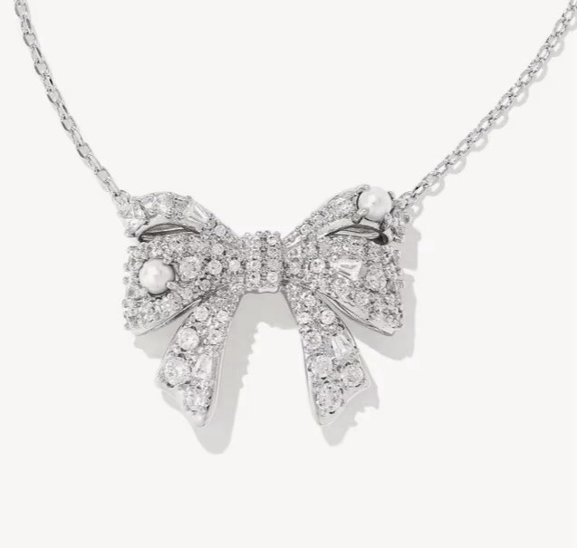 New Krista Silver Bow Short Pendant Necklace in White Mix on Kendra Scott Card