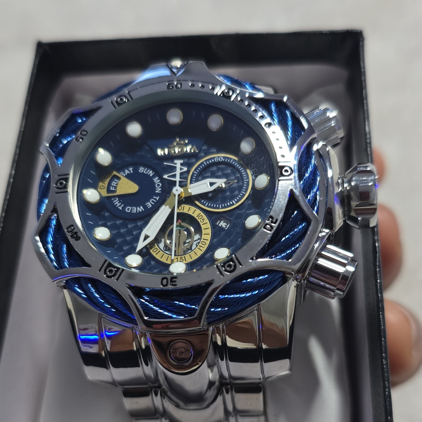 Invicta men’s watch, blue dial and silver bracelet. Not original but very nice s
