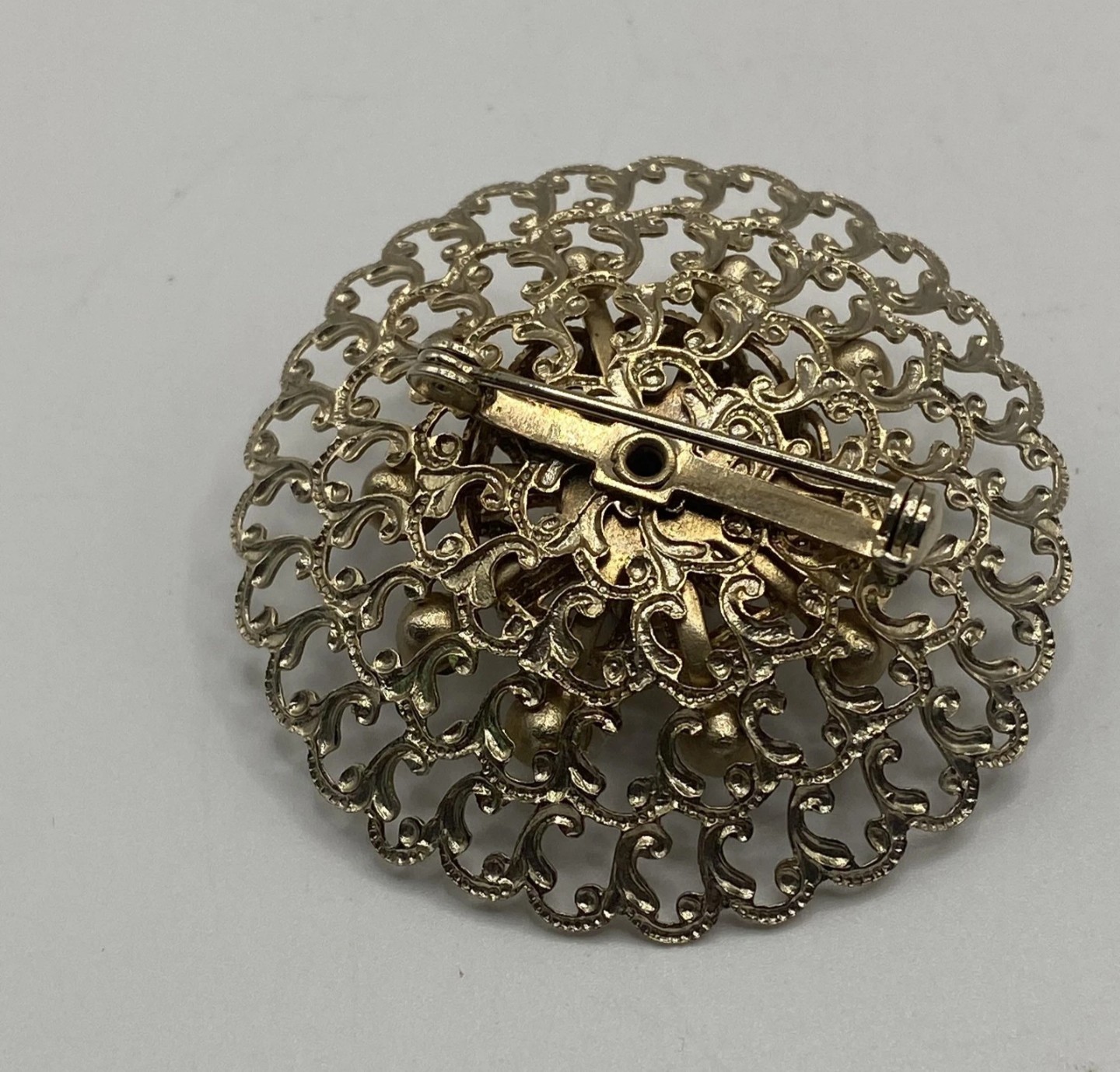 Gold Tone Round Filigree Brooch Pin w/ Purple Crystal Rhinestones, 2 in