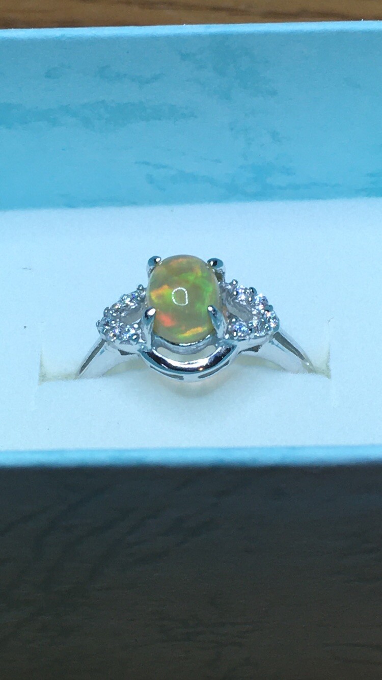 #138B- 0.95ct Genuine Ethiopian Welo Opal set in a Size 8.5 Sterling Silver Ring