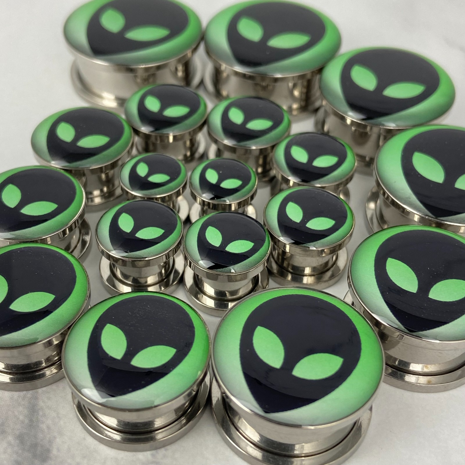 Pair of Screw on Alien Style 2 Picture Plugs gauges 16g to 1 inch