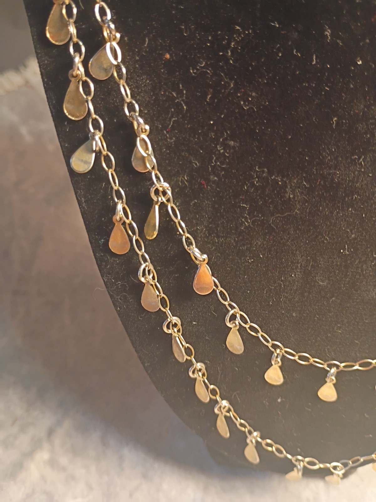 Gold Toned Tear Drop Charmed 56 Inch Taper Single Strand Necklace. J2