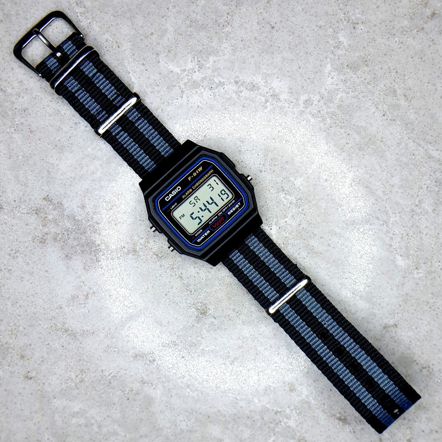 Casio F-91W Watch on a Black and Grey Ballistic Nylon Strap, F-91W-1YEF
