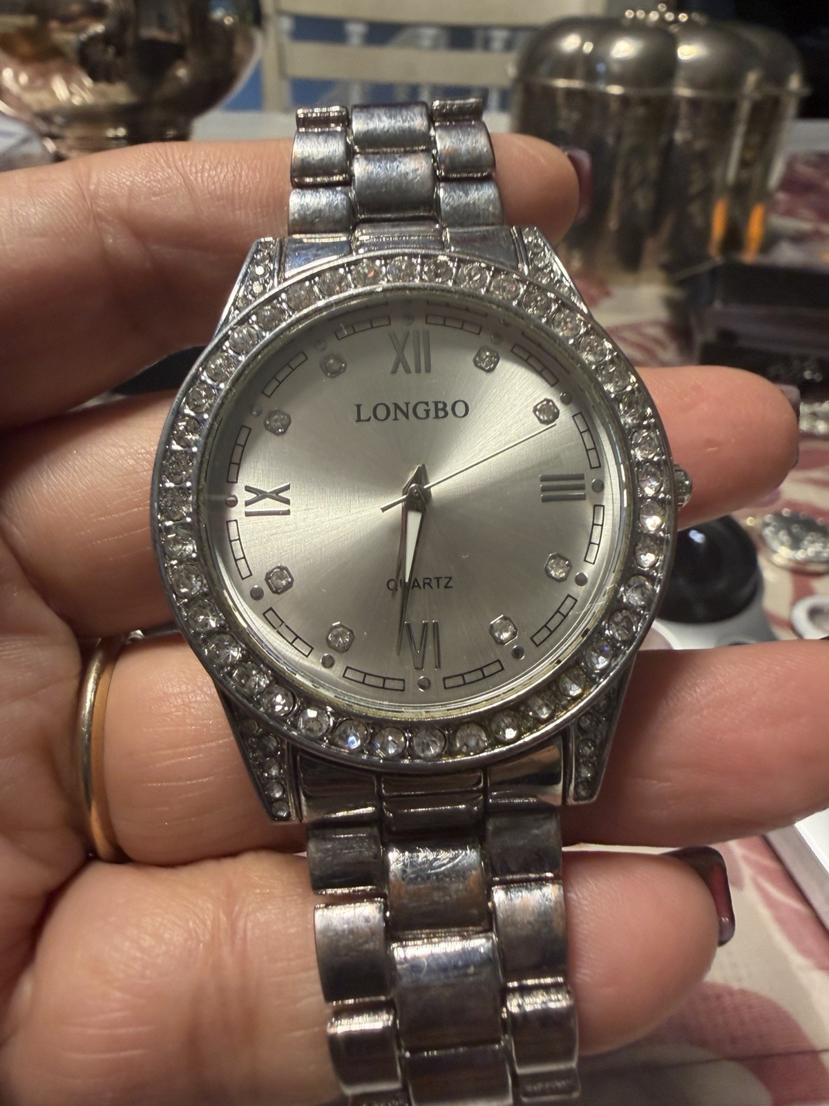 LONGBO Women’s Quartz Dress Watch Silver Rhinestone Bezel Sunburst Dial Roman