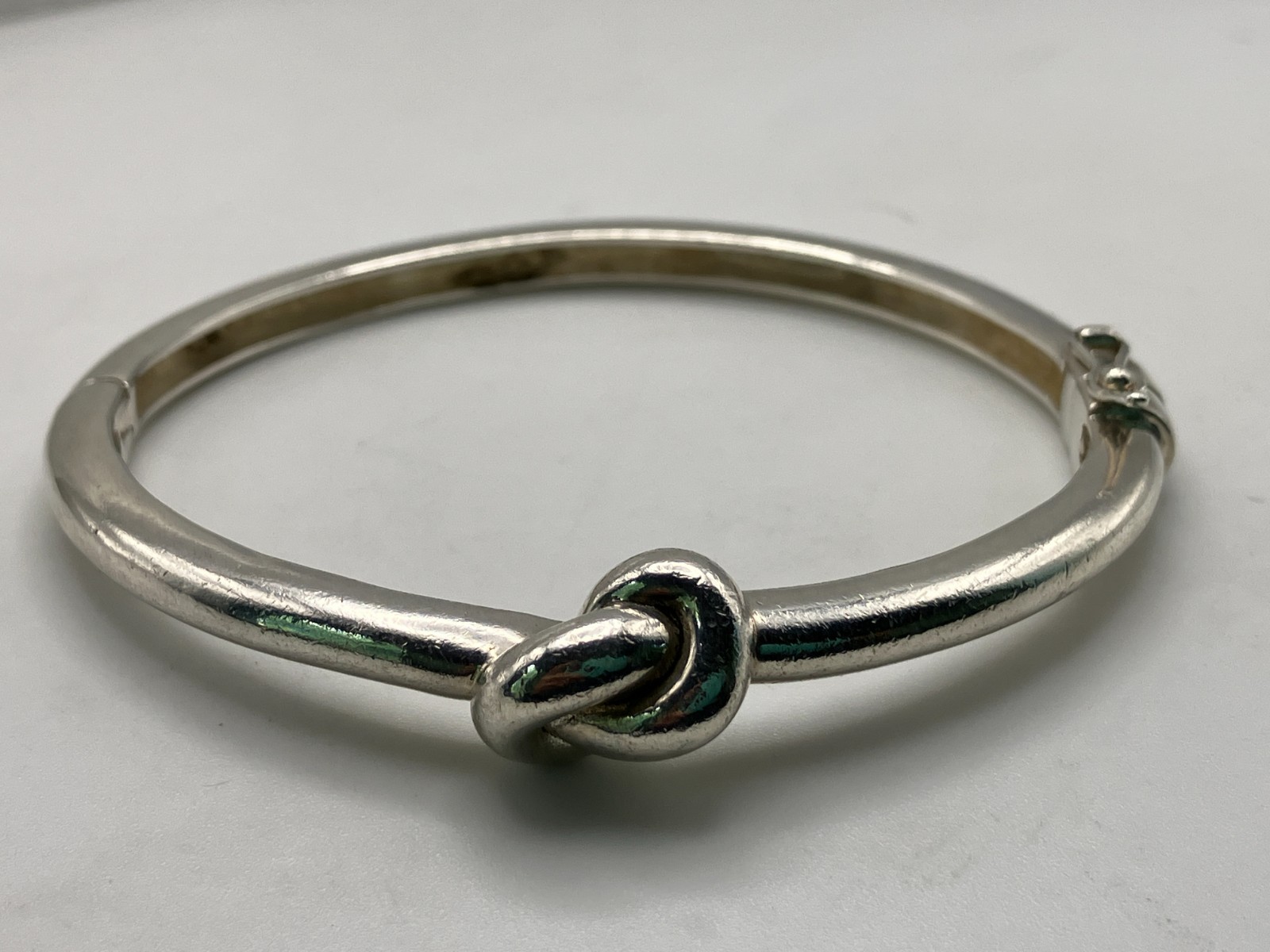 Sterling Silver Heavy Love Knot Hinged Bangle with Magnetic Closure Safety Latch