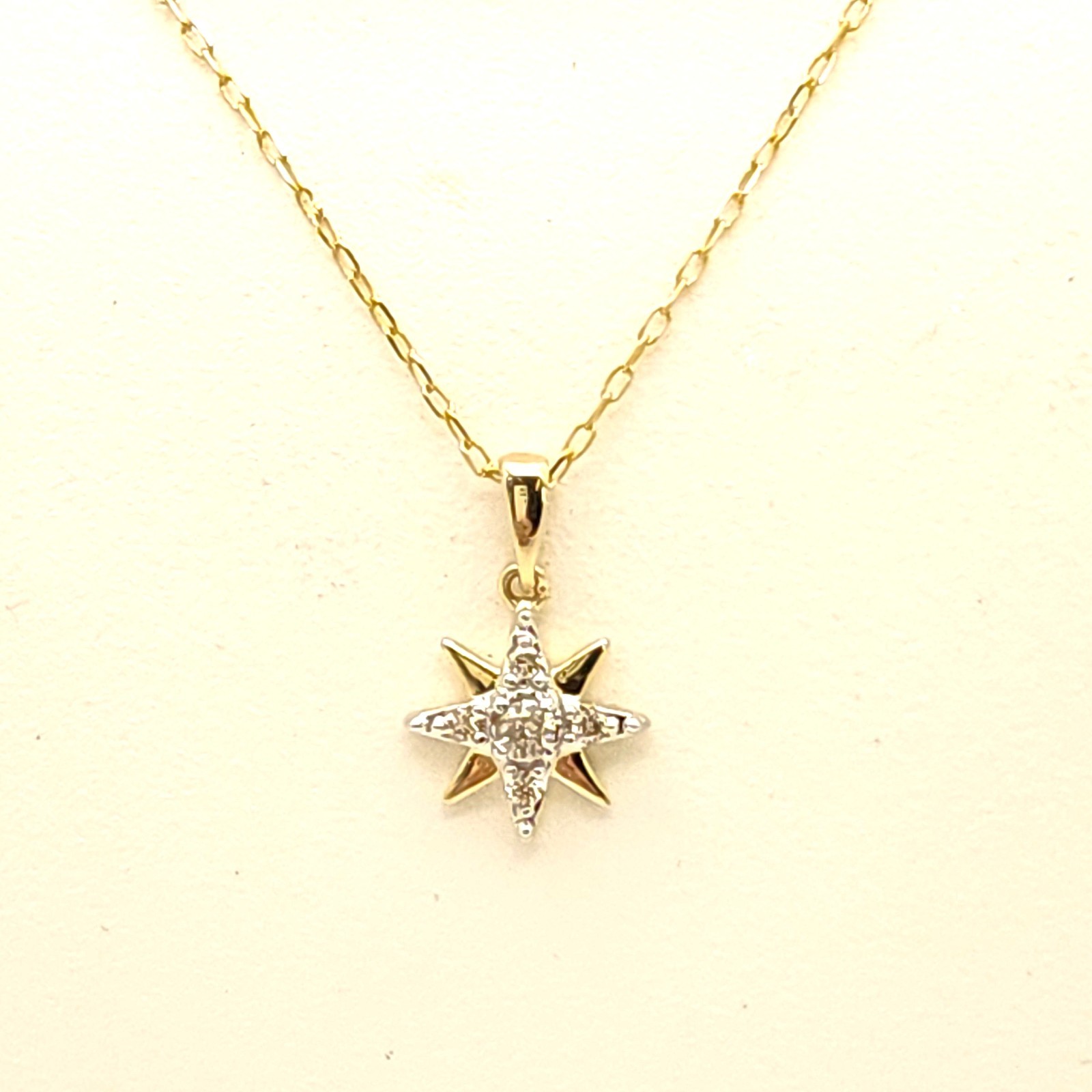 10k Gold Star Diamond Pendant on 10k Gold Chain Size: 16-18″ X 0.57mm