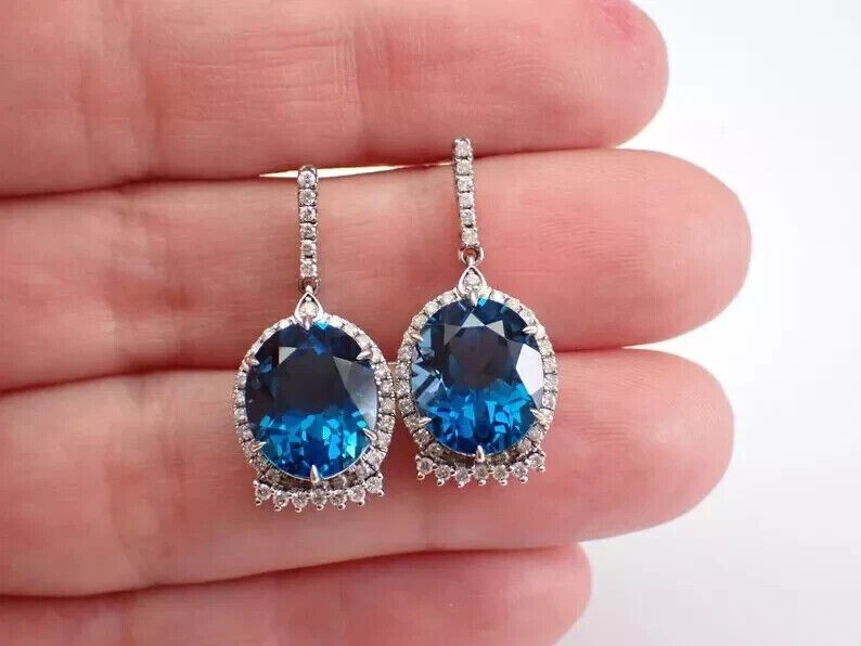 Oval Cut Simulated London Blue Topaz Halo Drop Earrings In 14k White Gold Plated