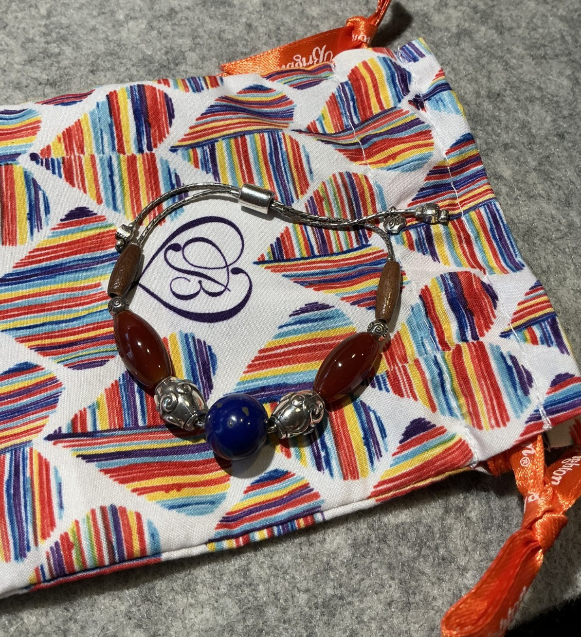 Brighton Sol Bracelet- wood beads blue & orange beads adjustable slider closure