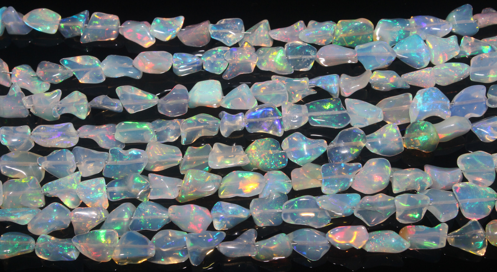 AAA+ Ethiopian Welo Fire Opal Polished Rough Play of Color Specimen 8” Strand