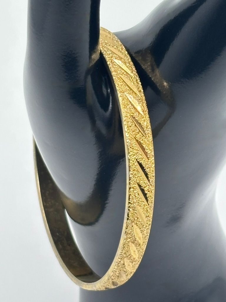 Vintage Monet Etched Textured and Shiny Gold-Tone Bangle Bracelet Signed 8-1/8″