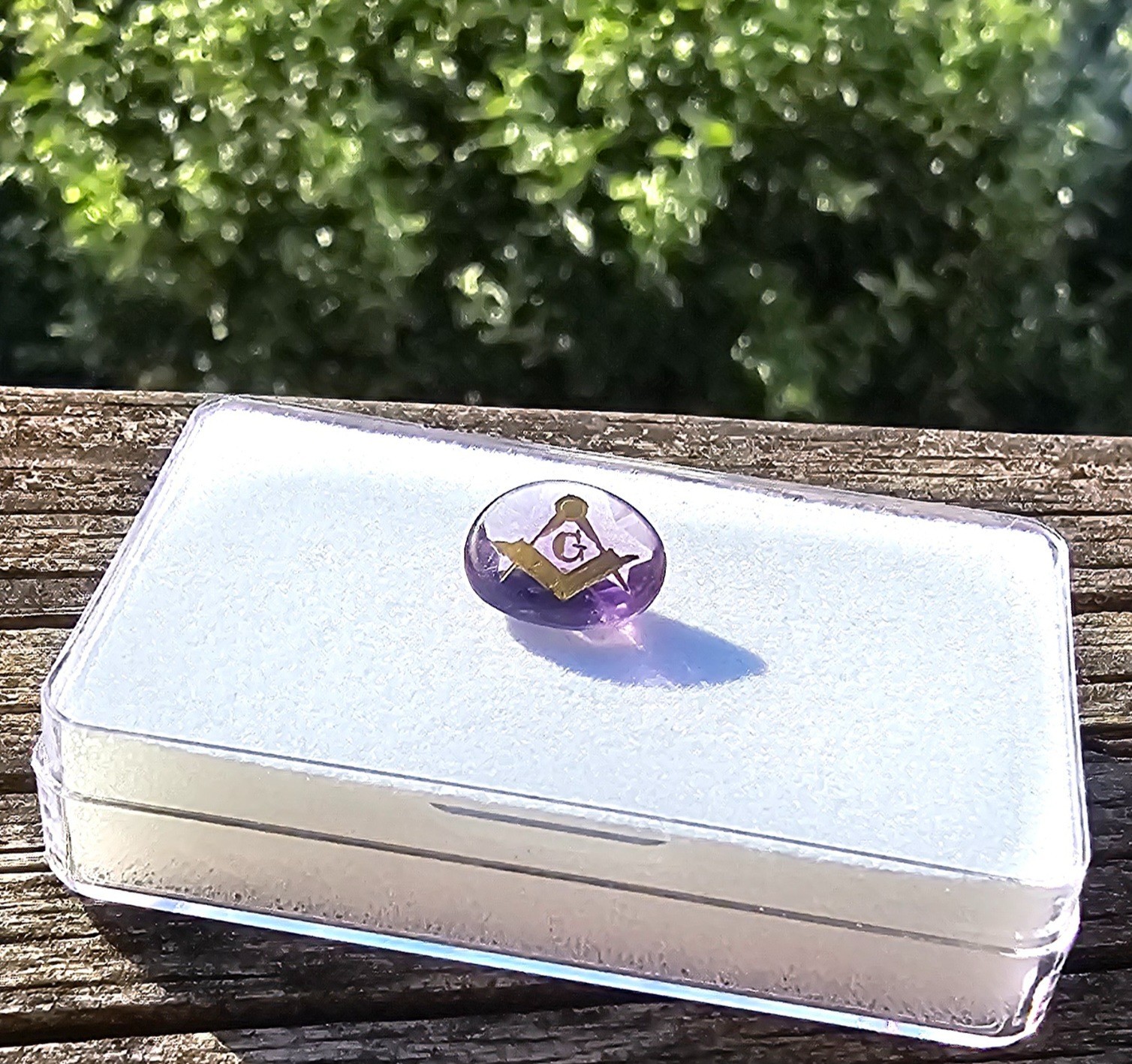 Amethyst 11.4×9.5mm Oval Loose Stone with Mason symbol