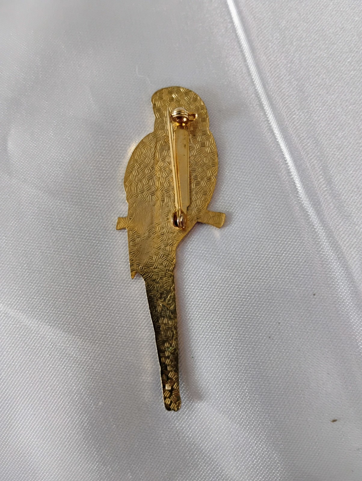 This vintage parrot brooch is from the Laurel Burch “Cezanne” collection