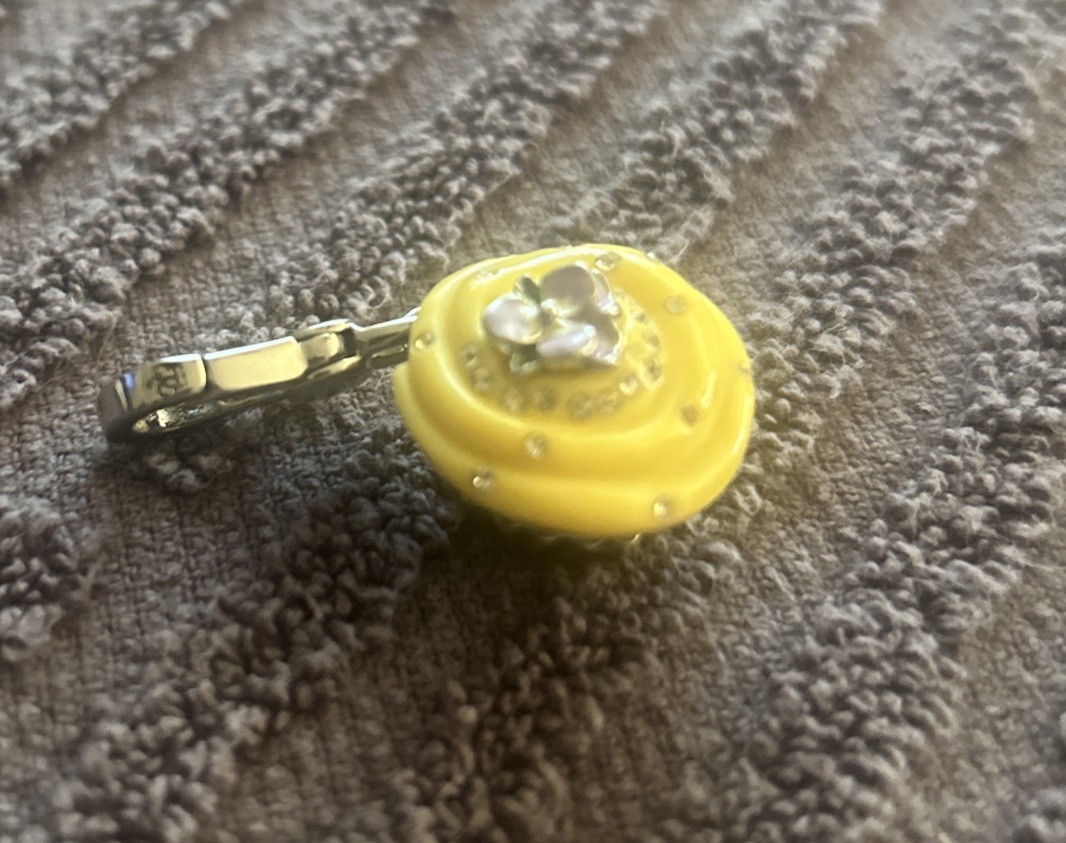 JUICY COUTURE 2009 Yellow Cupcake Charm Silver Lobster Clasp
