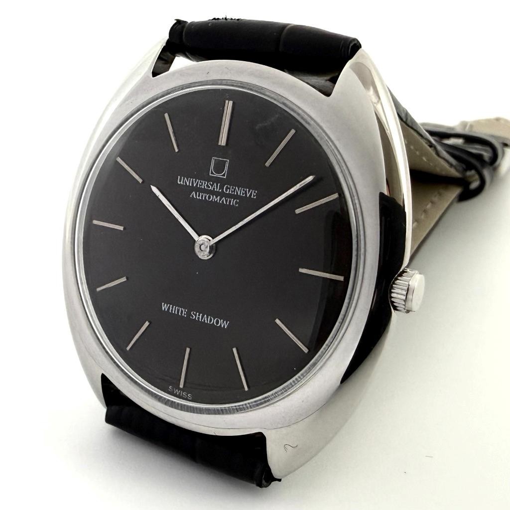ELEGANT UNIVERSAL WHITE SHADOW MICRO-ROTOR THIN CAL 2–66 VINTAGE BLACK DIAL