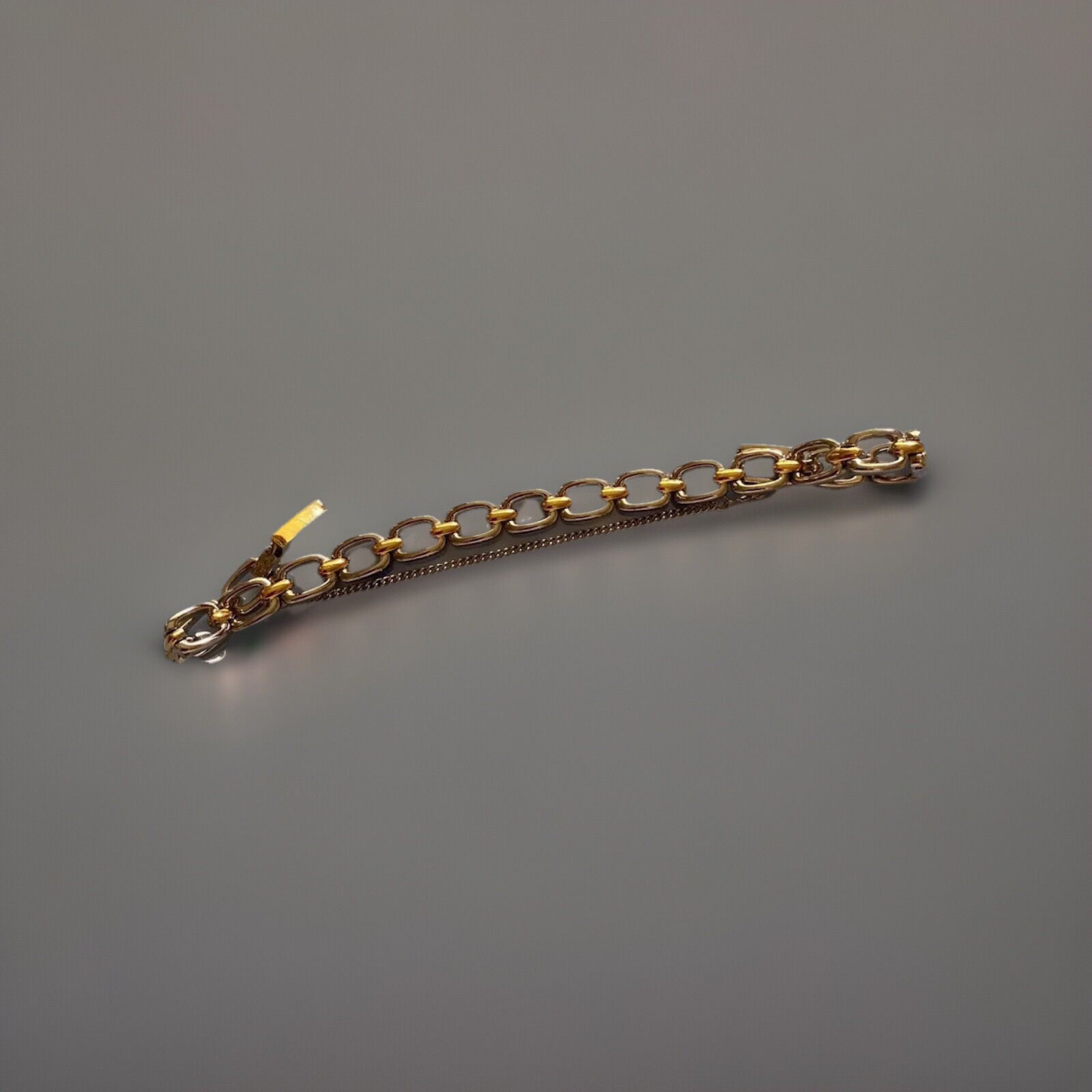 Cute 2 Tone Bracelet With Safety Chain.