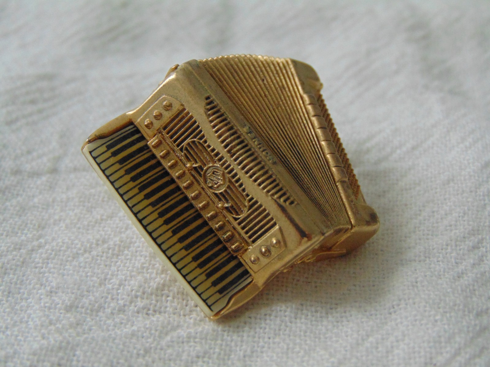 vtg Future Primitives U.S.A signed Acordian pin