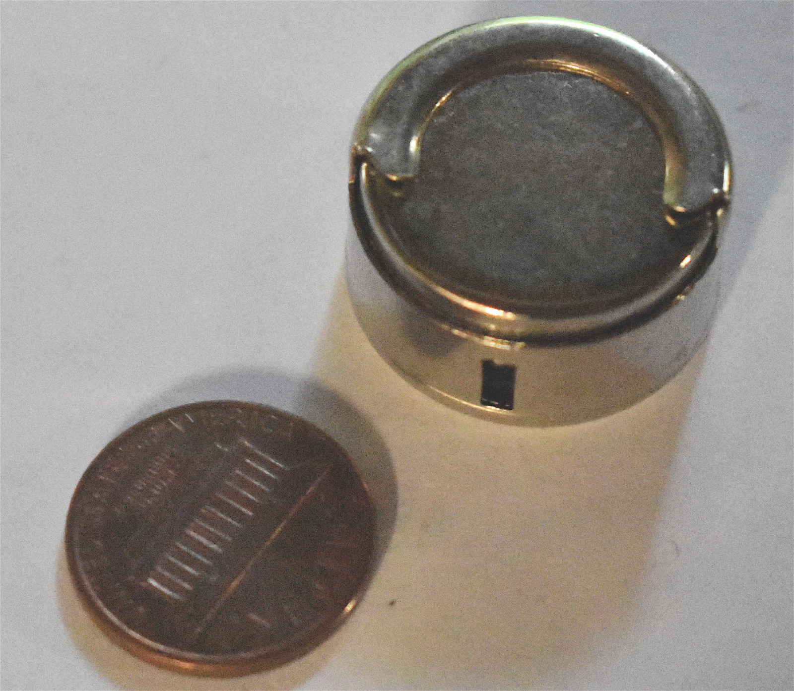 vintage METAL COIN HOLDER * STAINLESS COLOR * NEW OLD STOCK * SPRING * 3/4 in