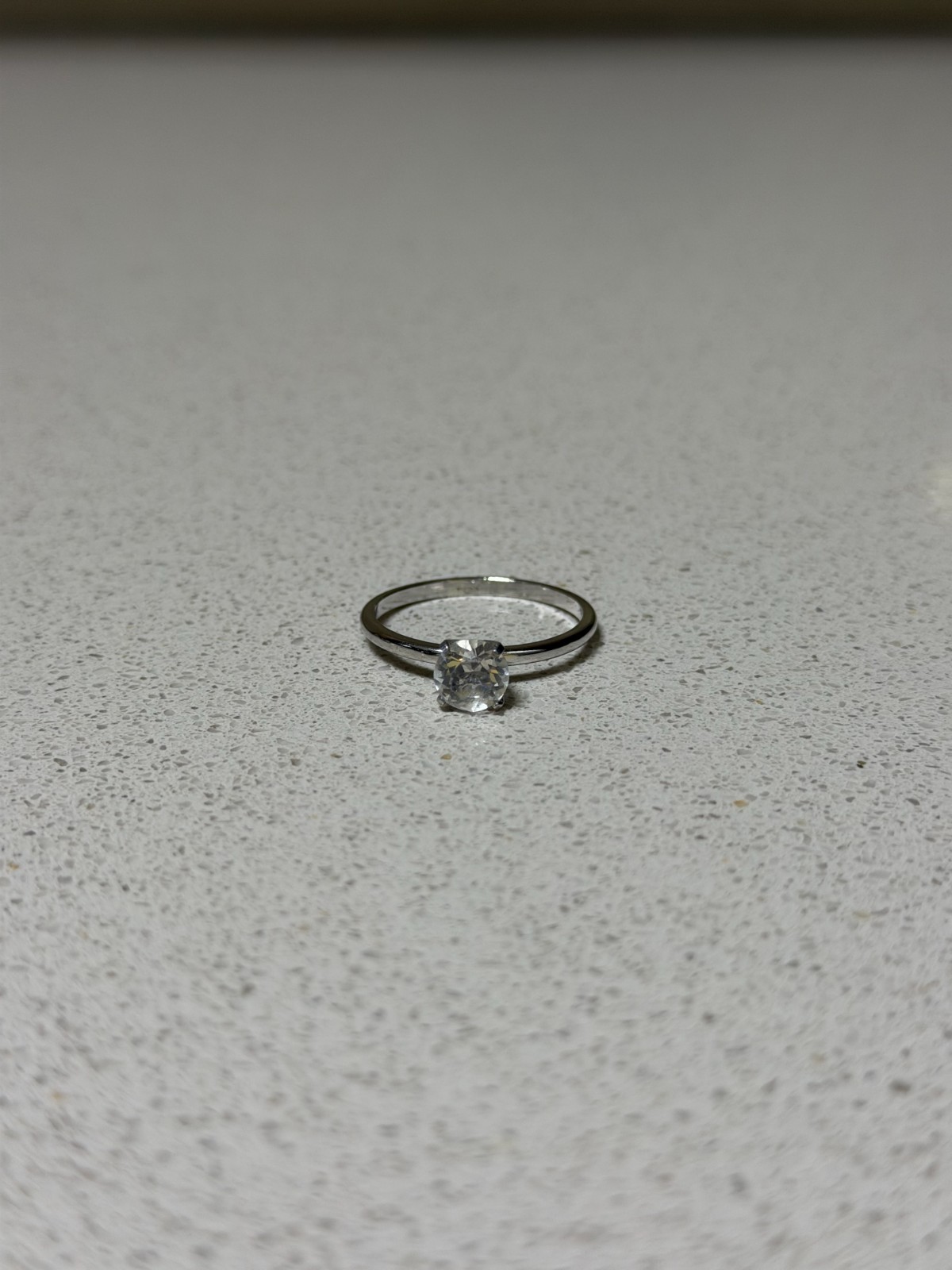 Silver Tone Round Ring With White/Transparent Main Stone Size 11.75