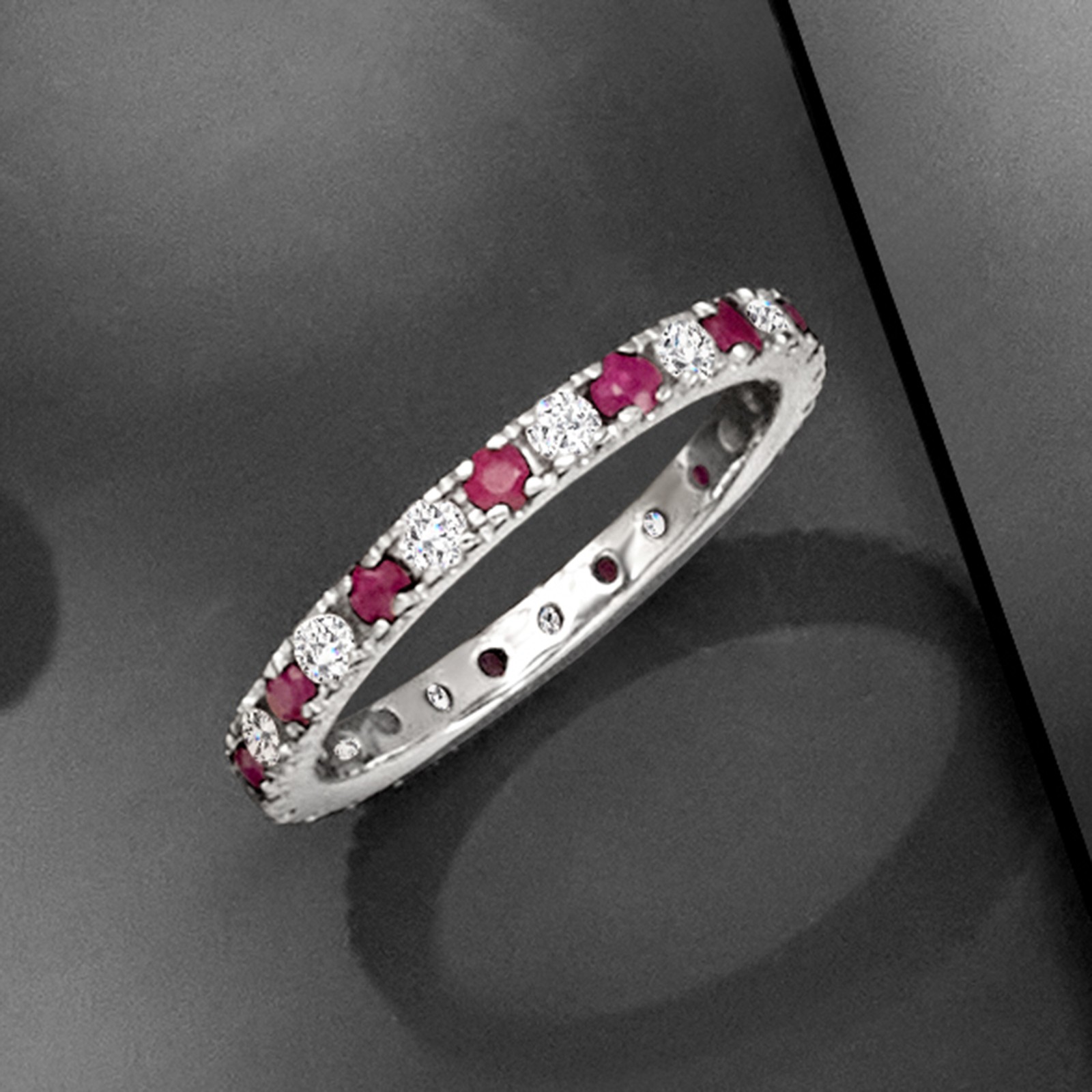 0.70 ct. t.w. Ruby and .50 ct. t.w. Diamond Eternity Band in 14kt White Gold