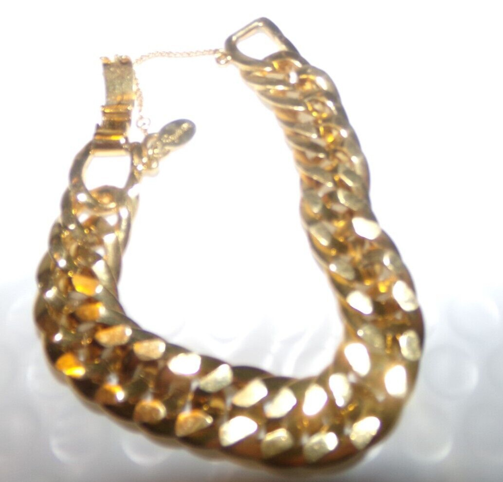 SIGNED ROGET TM GOLDTONE BRACELET WITH SAFETY CHAIN