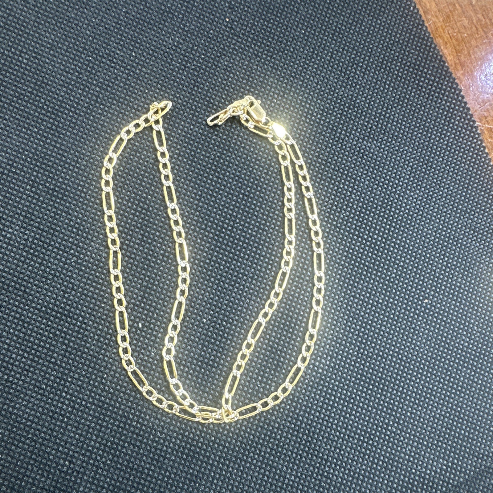 14 k solid Gold 18inches Figuro Diamond cut Chain.