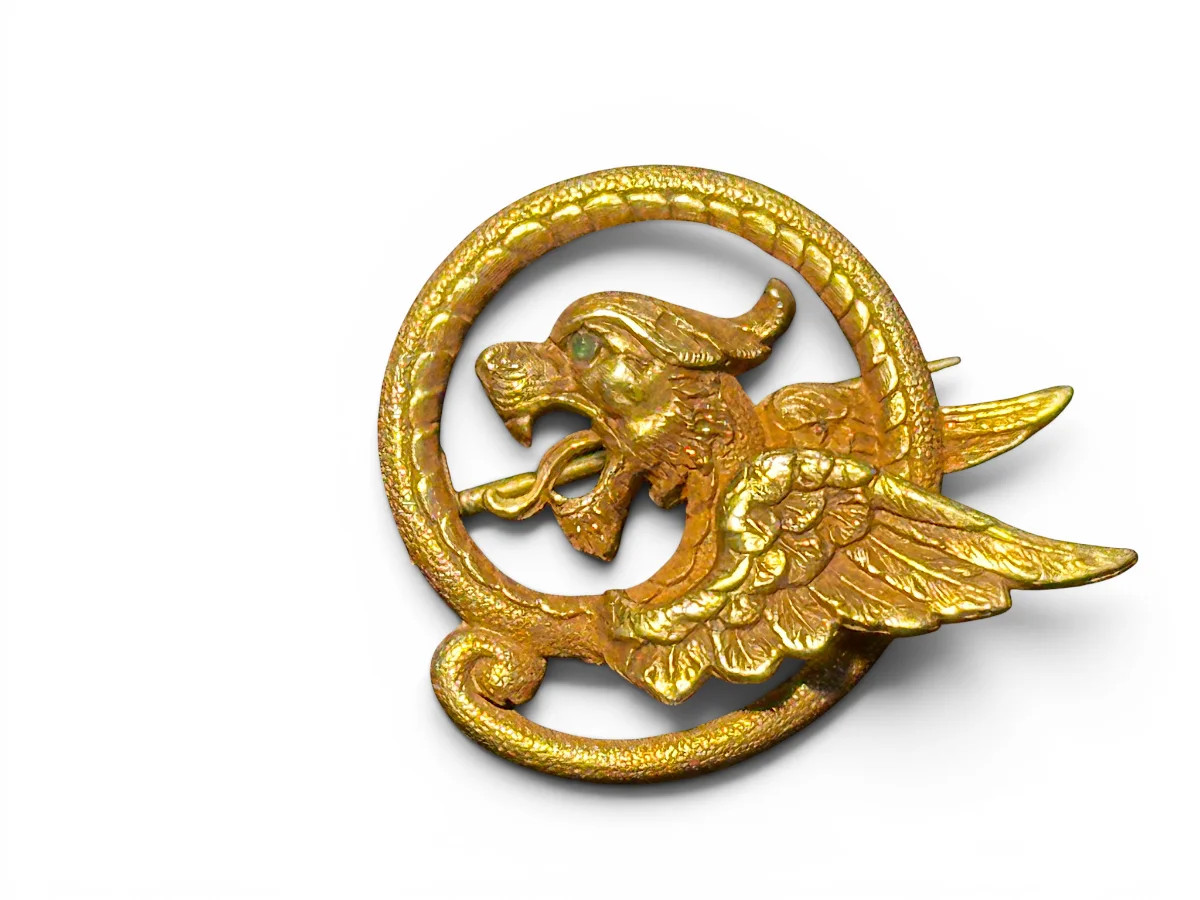 Antique English 14K Yellow Gold Chimera Motif Brooch With Emerald Eye