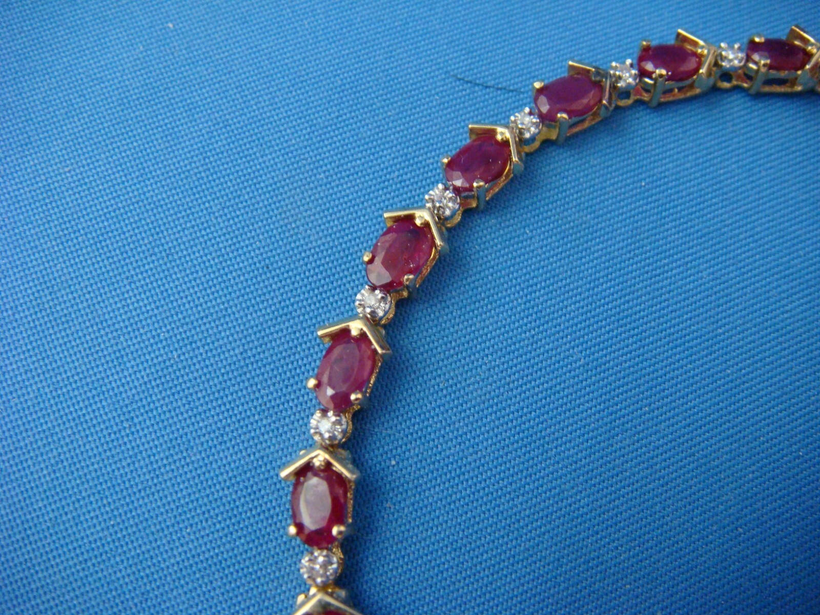 14 KT YELLOW GOLD GENUINE RUBY AND DIAMONDS TENNIS BRACELET 8.8 GRAMS 6.5 “