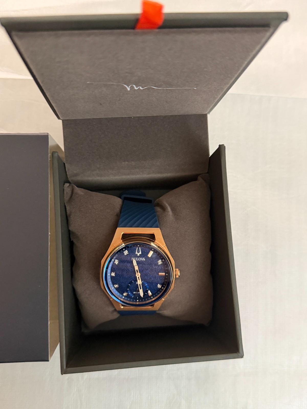 Bulova Curv Marc Anthony Blue Dial Women’s Watch 97P174. NIB $1,250. Rose Gold.