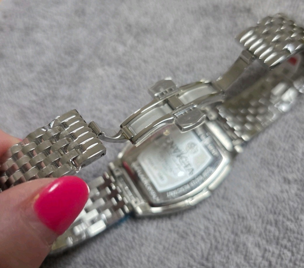 Invicta Women’s Tonneau 37mm Quartz Day/Date 24HR Silver Dial SS Bracelet Box